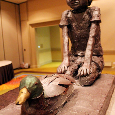 Boy And Duck Cake Sculpture