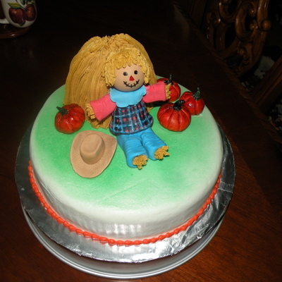 Scarecrow And Pumpkins