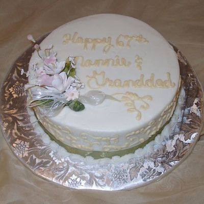 Scrolls With Small Gumpaste Arrangement.