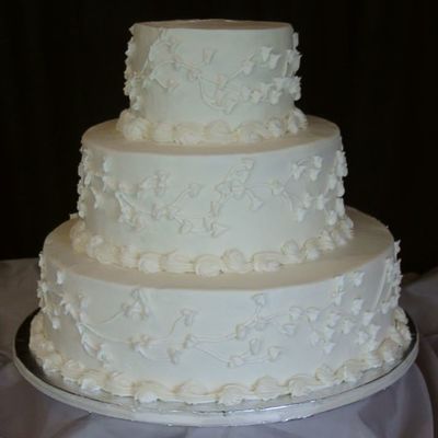3 Tiered Ivory Cake With Vines And Leaves