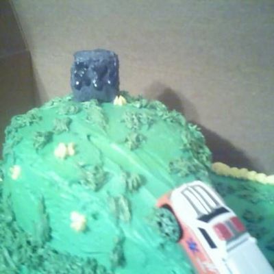 Close Up Of Ambulance Going Up Over The Hill