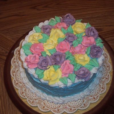 Round Cake Topped With Roses