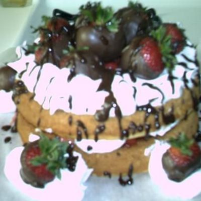 White Cake With Strawberry Filling And Topped With Choc Covered Straw