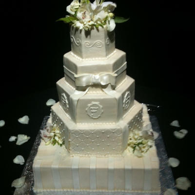 Buttercream Wedding Cake With Fondant Accents.
