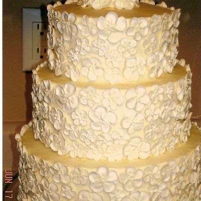3-Tier Round Bridal Shower Cake With White Royal Icing Flowers And Ivory Icing