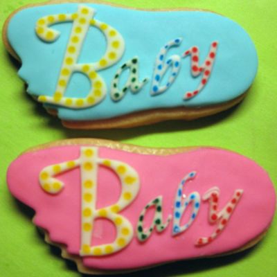 Pink And Blue Baby's Feet