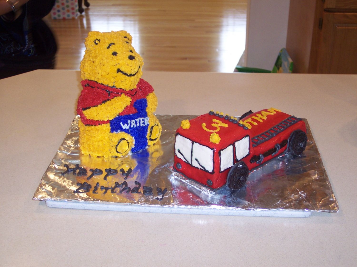 Firefighter Winnie The Pooh And Firetruck Cake