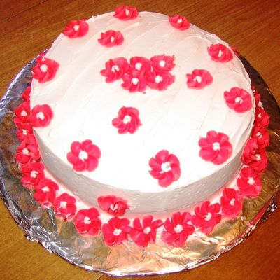 Red Flowers On White Cake