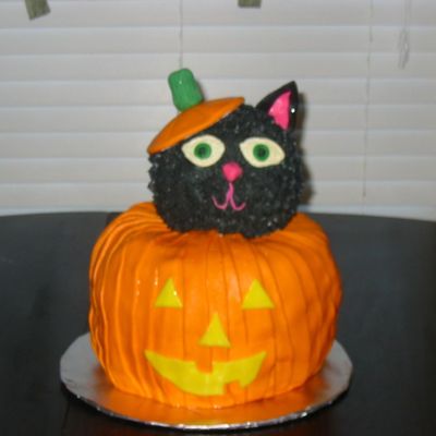 Cat In Jack-O-Lantern
