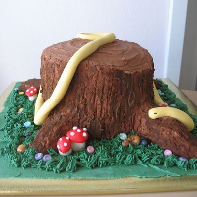 Snake On A Tree Stump