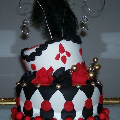 Red, Black And Gold Topsy Turvy Cake...