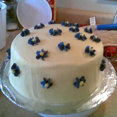 Bold Blue Flowers And Yellow Frosting