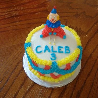 Clown Playing The Drum