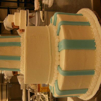 White And Blue Cake With Purple Flowers