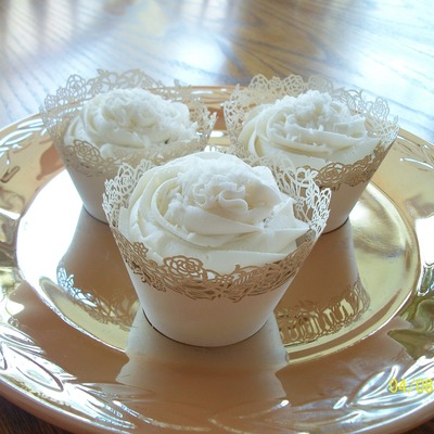 Coconut With Coconut Icing, And Shredded Coconut On Top