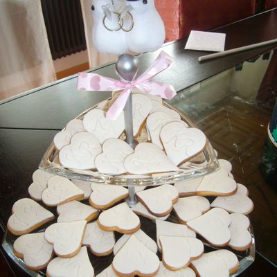 Heart Shaped Cookies With The Initals Of Bride And Groome