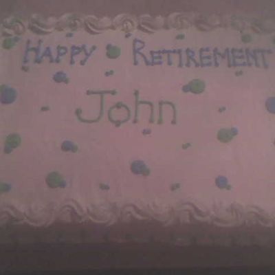 Johnretirementtopofcake.jpg