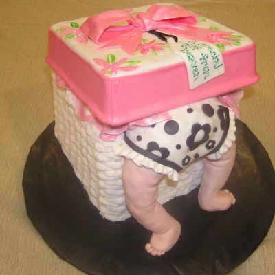 Baby Climbing Out Of Christmas Present