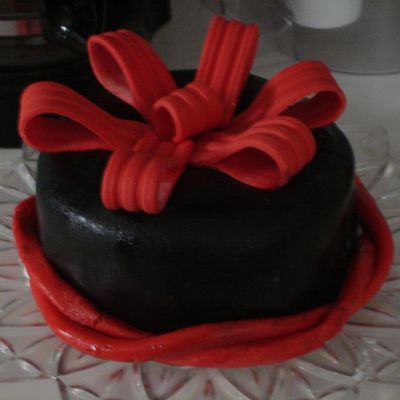 Black Fondant With Red Fondant Bow