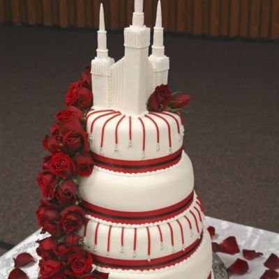 Stacked Wedding Cake With Red Roses