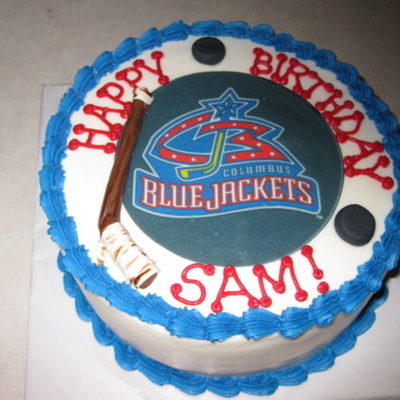 Another Cake With Hockey Stick On It