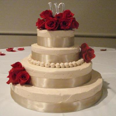 Ivory Wedding Cake With Fresh Red Roses