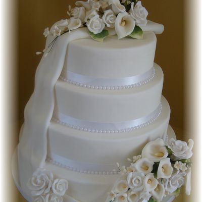 White Wedding With Cala And Roses On Swag