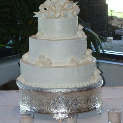 Buttercream With Gumpaste Bow And Abstract Roses