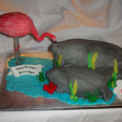 Flamingo Kissing A Manate :)