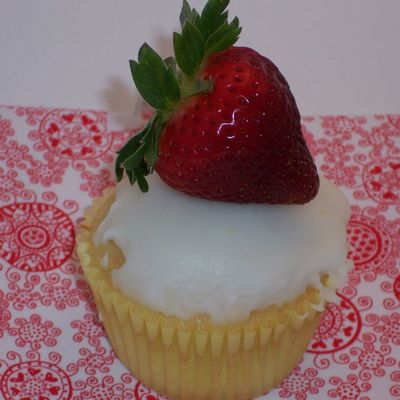 Vanilla Cupcake W/ Cream Cheese And Strawberry Filling, Topped With Lemon Glaze