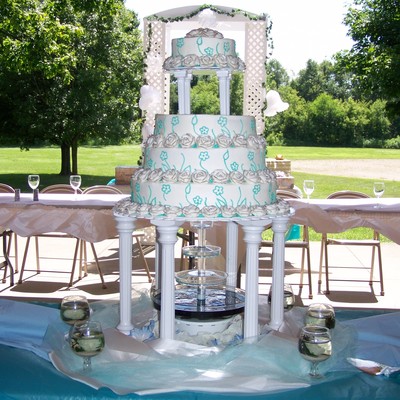 Teal Piping With White Roses