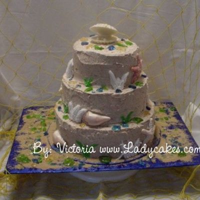 Cholcoalte Molded Sea Shell Cake Spackled Frosting Buttercream Glass Pieces