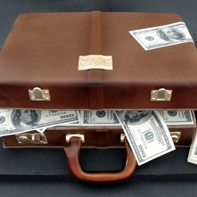Briefcase And Money