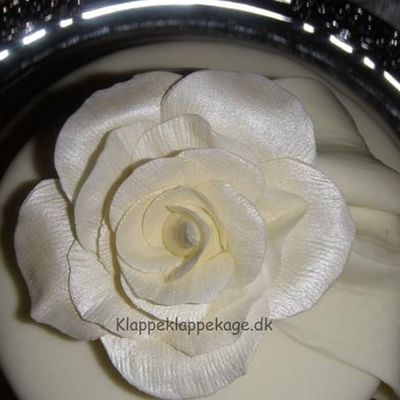 The Rose At The Top Of 5 Tier Wedding Cake