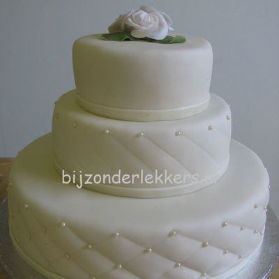 Off White Round Wedding Cake With Soft Pink Roses