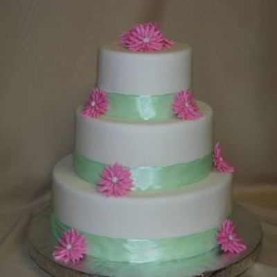 Fondant Cake With Gumpaste Pink Daisies And Green Ribbon
