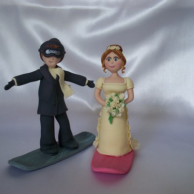 Bride And Groom Snowboarding