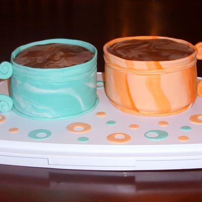 Two Marble Mugs Of Steaming Coffee