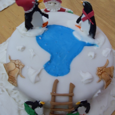 Santa Watching The Penguins Celebrating Christmas