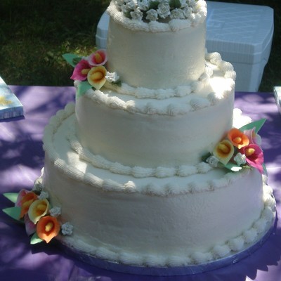 Wedding Cake With Multicolored Calla Lillies