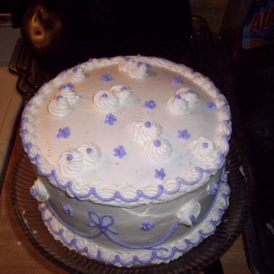 Chocolate Scratch Cake With White Buttercream And Purple Accents