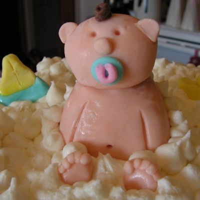 Close Up Of Baby & Feet Sticking Out Of The Bubbles