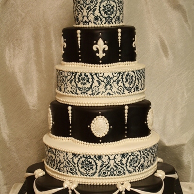 Scrolls And Cameo Wedding Cake