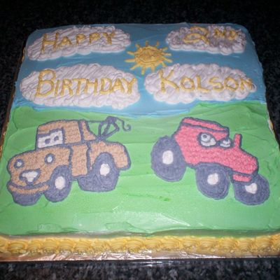 Towmater And Tractor In Field