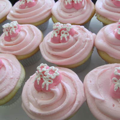 Pink Cupcakes With Buttercream Baby Booties