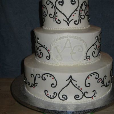 Black Swirls On White Cake