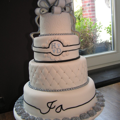 White Wedding Cake With Silver And Black Accents