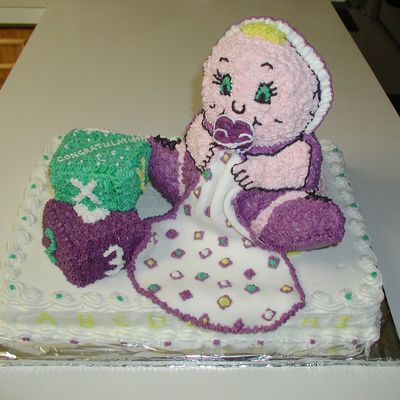 Sitting Baby With Blanket And Blocks.
