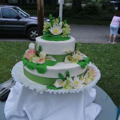 Lotus/bamboo And Orchid Wedding Cake