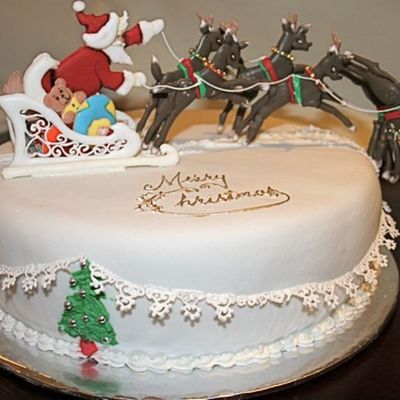 Father Christmas And His Reindeer